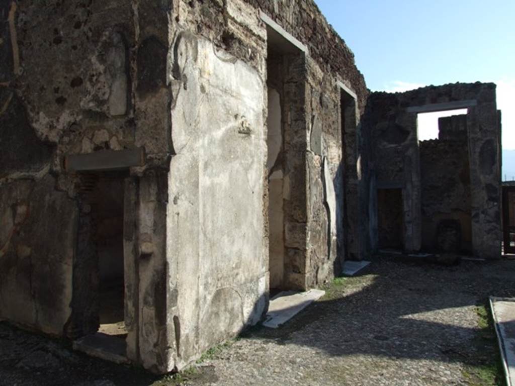 V.1.7 Pompeii. December 2007. Looking south along east side of atrium.