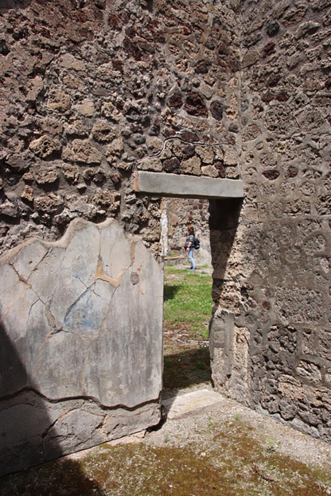 V.1.7 Pompeii. May 2024.
Room 15, north-east corner, with doorway into room 14. Photo courtesy of Klaus Heese.
