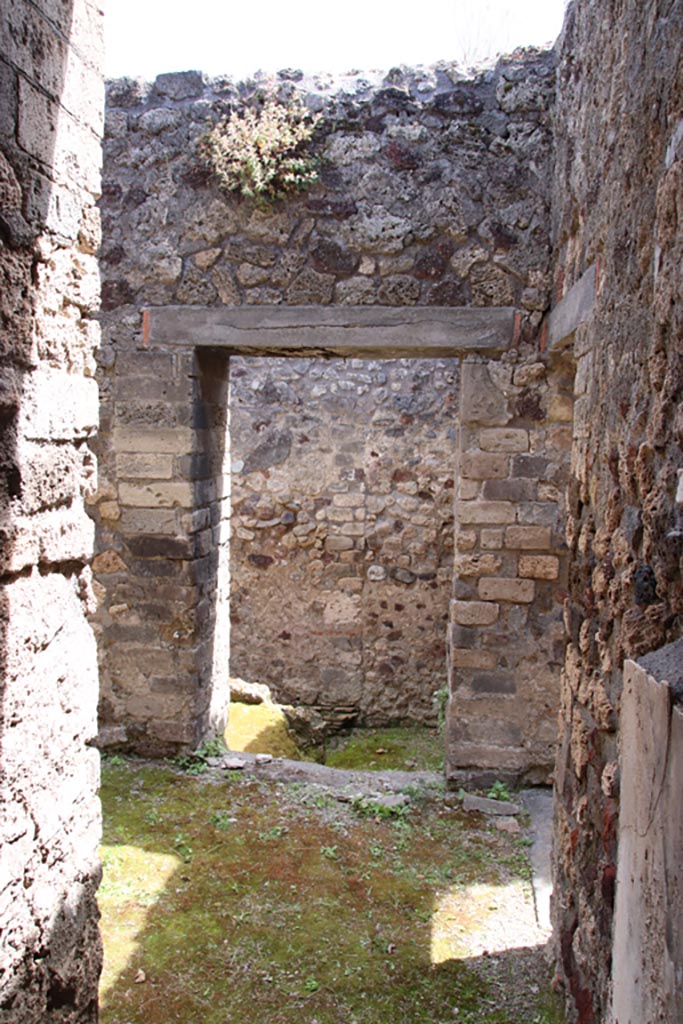V.1.7 Pompeii. May 2024.
Looking south towards doorway to room “i”. Photo courtesy of Klaus Heese.