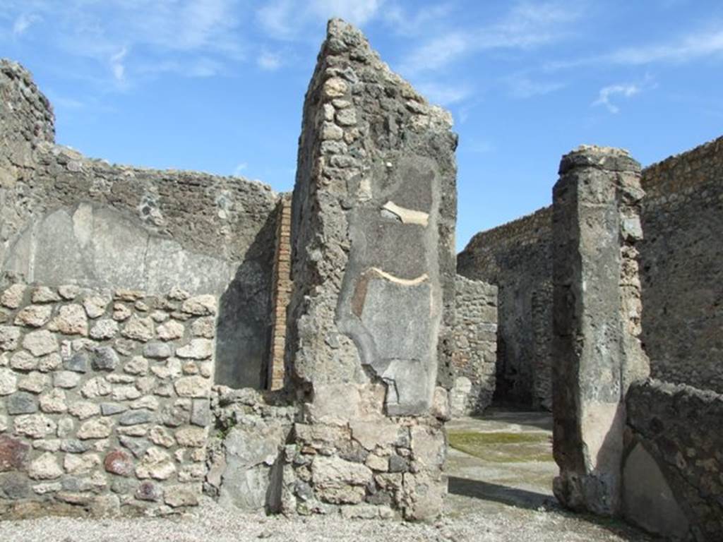 V.I.14 Pompeii. March 2009. East wall, with doorway to atrium of V.1.15