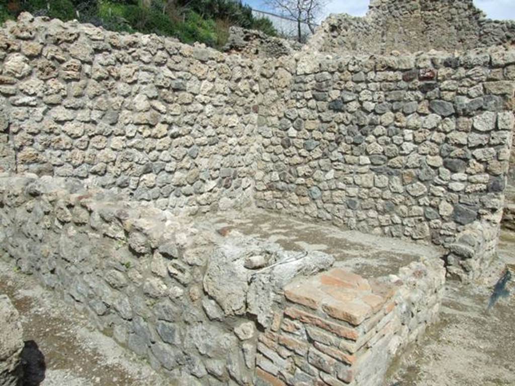 V.1.15 Pompeii. April 2009. Looking north-east towards room in bakery on north side.
According to CTP in 1986, “This pistrinum was severely damaged by bombs during the bombing of September 1943. The whole north-east portion was destroyed. One bomb partially broke up the roadway in front of the street entrance. This has now been restored in part, whereas the four rooms to the north-east and part of the north perimetral wall have not yet been restored.”
See Van der Poel, H. B., 1986. Corpus Topographicum Pompeianum, Part IIIA. Austin: University of Texas. (p.70)