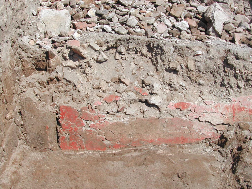 V.1.15 Pompeii. 2003.
“The red plaster on the pluteus facing the ambulatory in 2003. The plaster was in very bad condition.”
Photo by Henrik Boman.
Photo and words courtesy of the Swedish Pompeii Project.