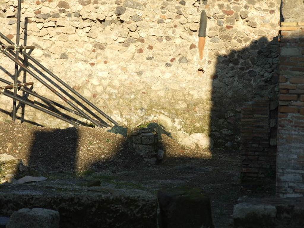 V.1.15 Pompeii. December 2006. Looking east towards rear of bakery, under restoration.