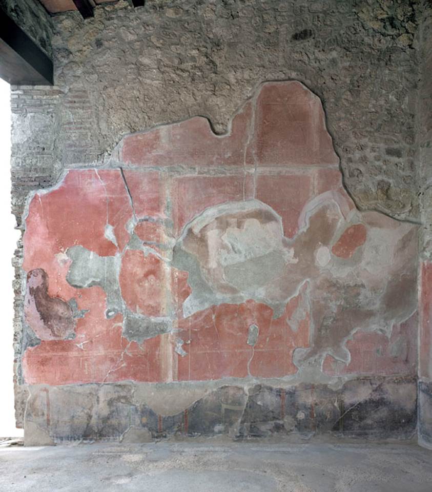 V.1.18 Pompeii. 2012.
Room “o”, exedra, west wall. Photo by Hans Thorwid.
“West wall in 2012. Lower part and floor line taken in 2012.”
Photo and words courtesy of The Swedish Pompeii Project.