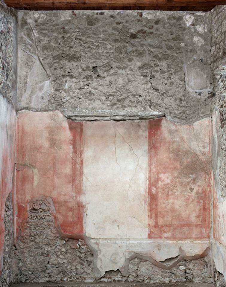 V.1.18 Pompeii. 2012.
Room “p”, oecus, north wall. Photo by Hans Thorwid.
“North wall in 2012.
Restored parts of the wall photographed and merge with the lower part and floor line of earlier photos from 2005-07.”
Photo and words courtesy of The Swedish Pompeii Project.