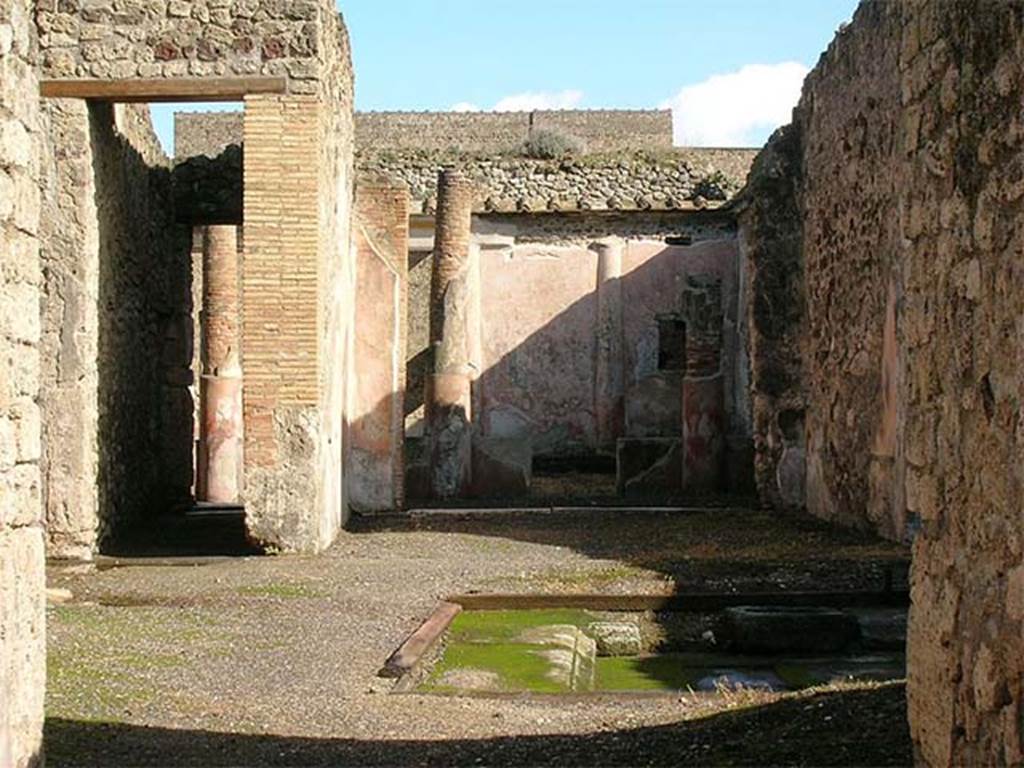 V.1.18 Pompeii. November 2012. Looking east across atrium “b” to tablinum “g”.
Photo Wikimedia, Courtesy of author Mentnafunangann.
Use subject to a Creative Commons Attribution-Share Alike 3.0 Unported Licence