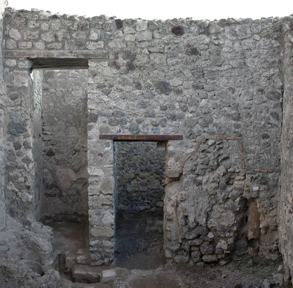 V.1.20 Pompeii. 2012. Room “d”. Photo by Hans Thorwid.
“East wall of kitchen in 2012 after restoration in 2008.
Restored parts of the wall photographed and merge with the lower part and floor line of earlier photos from 2005-07.”
Photo and words courtesy of The Swedish Pompeii Project.