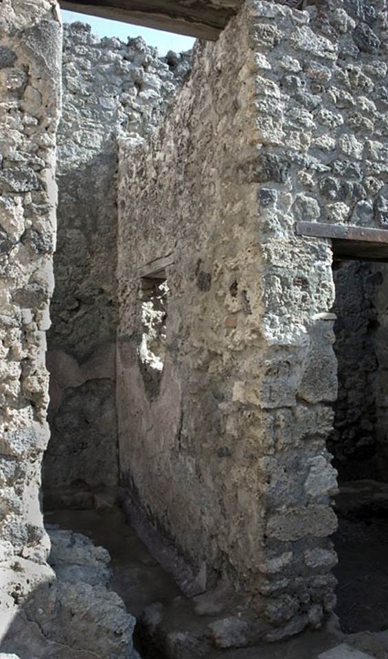 V.1.20 Pompeii. 2005. Room “f”. Photo by Hans Thorwid.
South wall of room with tall doorway in east wall of kitchen.
Photo courtesy of The Swedish Pompeii Project.