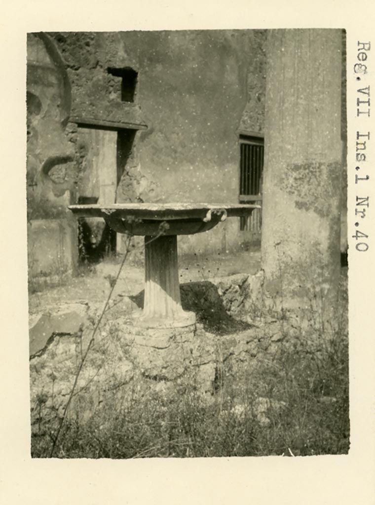 V.1.26 Pompeii (but shown as being VII.1.40 Pompeii.) Pre-1937-1939
Looking north across portico towards doorways to room “p”, on left, and “q”, at east end of north portico.
Photo courtesy of American Academy in Rome, Photographic Archive. Warsher collection no. 477.
