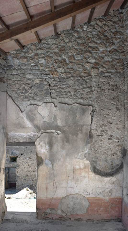 V.1.26 Pompeii. 2012. Room “s”, north wall with doorway. Photo by Hans Thorwid.
“North wall in 2012. Restored parts of the wall photographed and merge with the lower part and floor line of earlier photos of 2005-07.”
Photo and words courtesy of The Swedish Pompeii Project.