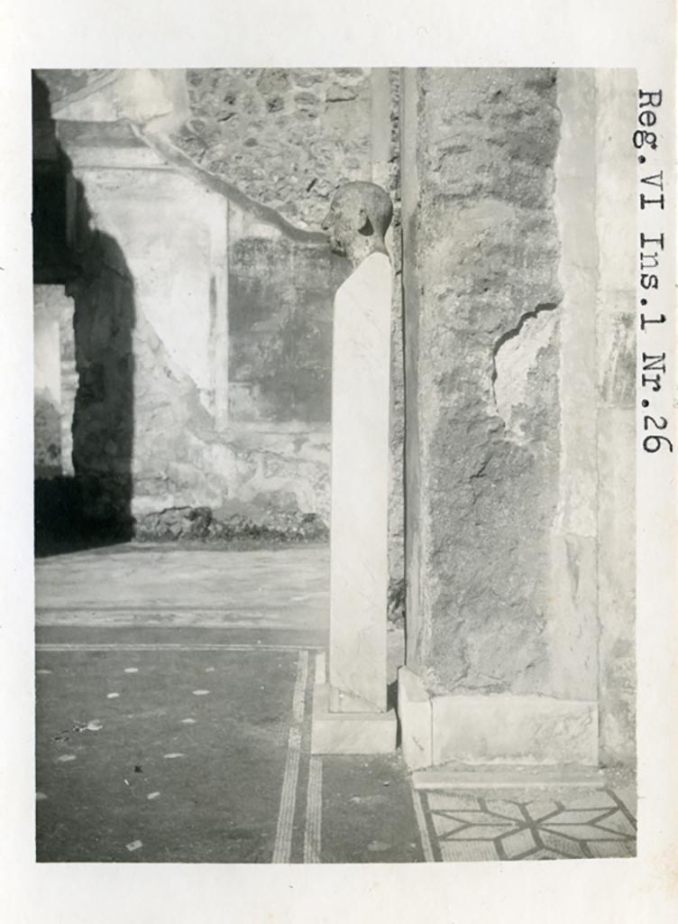 V.1.26 Pompeii but shown on the photo as VI.1.26. Pre-1937-39. 
Room “b”, looking north across atrium with herm bust, towards north wall of ala with painted wall decoration.
Photo courtesy of American Academy in Rome, Photographic Archive. Warsher collection no. 475.

