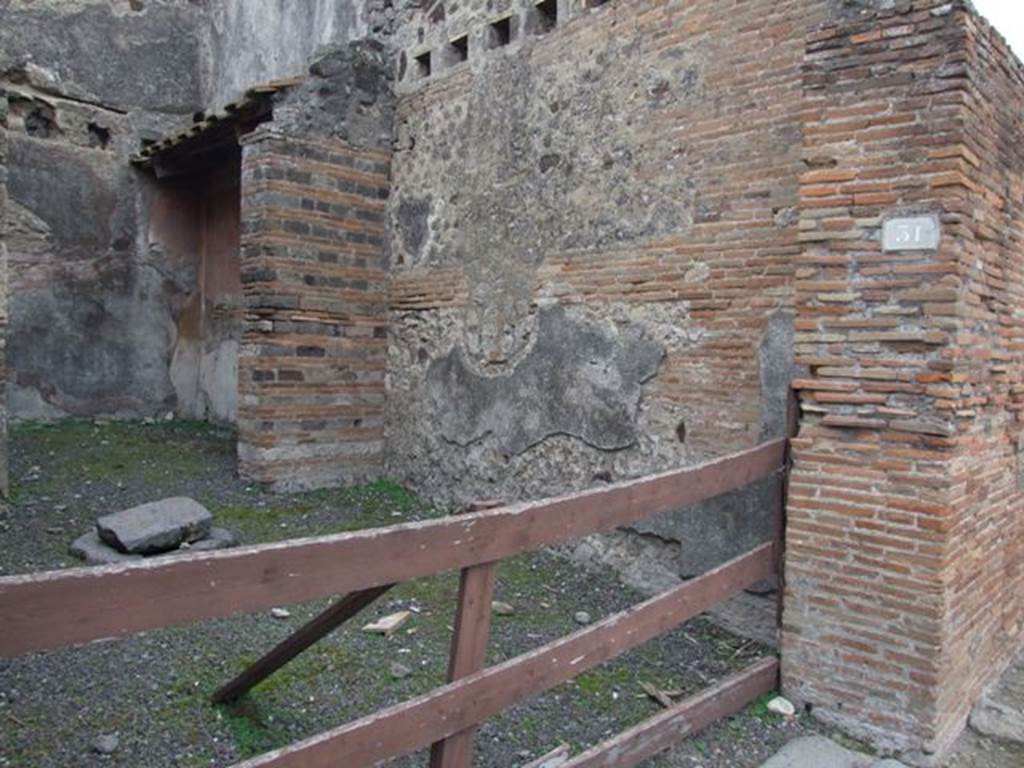 V.1.31 Pompeii. Shop with dwelling. December 2007. South wall of shop.