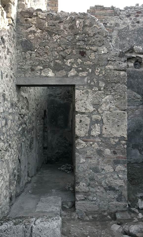 V.1.31 Pompeii. c.2010.
Looking towards north end of east wall of shop-room. Photo by Hans Thorwid.
“Room 3 is a corridor, leading to a latrine niche situated in the north-east corner of the taberna.”
Photo and words courtesy of The Swedish Pompeii Project.