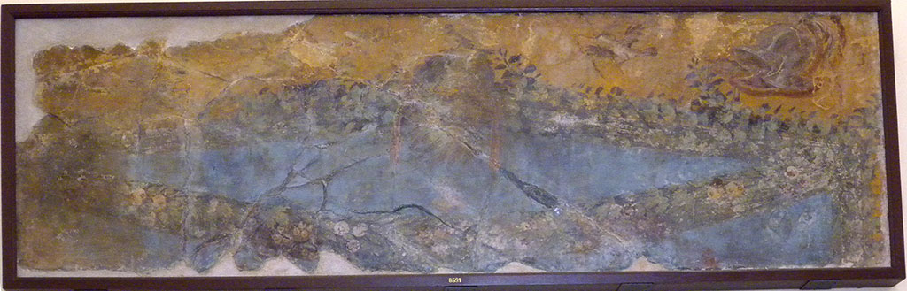 V.1.18/29/30/31/32 Pompeii? May 2010. Found 6th April 1748 in V.1.
Wall painting showing the first picture found in the excavations of the Cività “garland with mask of bearded satyr, and bird resting on the festoon”.
Now in Naples Archaeological Museum. Inventory number 8591.
It was possibly found in the area of V.1.29/30/31/32 near the crossroads of the Via Stabiana and Via di Nola.
However, PPM (III, 540), thinks that the excavations started in V.1.18, House of the Epigrams, in April 1748 so it could have come from there, or vicinity.
See Pagano, M. and Prisciandaro, R., 2006. Studio sulle provenienze degli oggetti rinvenuti negli scavi borbonici del regno di Napoli. Naples: Nicola Longobardi. (p.11)