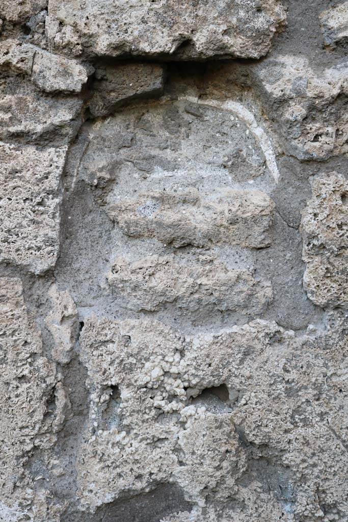 V.2.3, Pompeii. December 2018.
Remaining niche/recess in west wall of caupona. Photo courtesy of Aude Durand.