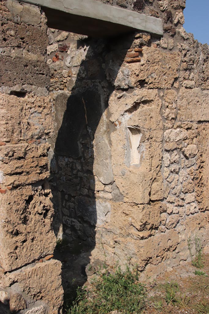 V.2.3 Pompeii. October 2023.
Doorway in north-wall leading to steps to upper floor. Photo courtesy of Klaus Heese.