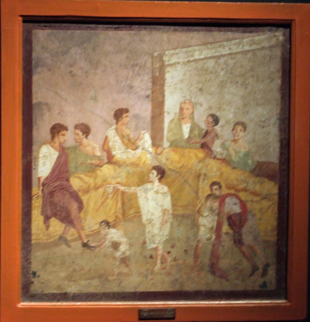 V.2.4 Pompeii. Room 15, painting of banqueting scene from east wall of triclinium.
End of the Banquet. The guests are rising but one of them cannot stand up without assistance.
Now in Naples Archaeological Museum. Inventory number 120029.
See Ruesch A., Ed, 1909. Illustrated Guide to the National Museum in Naples. Naples: Richter. (p. 114-5).
See Richardson, L., 2000. A Catalog of Identifiable Figure Painters of Ancient Pompeii, Herculaneum. Baltimore: John Hopkins (p.176, 178)
See Fröhlich, T., 1991. Lararien und Fassadenbilder in den Vesuvstädten. Mainz: von Zabern. Taf. 20,2.
See Gusman, P. (1900). Pompei, the city, its life and art, (p.313).