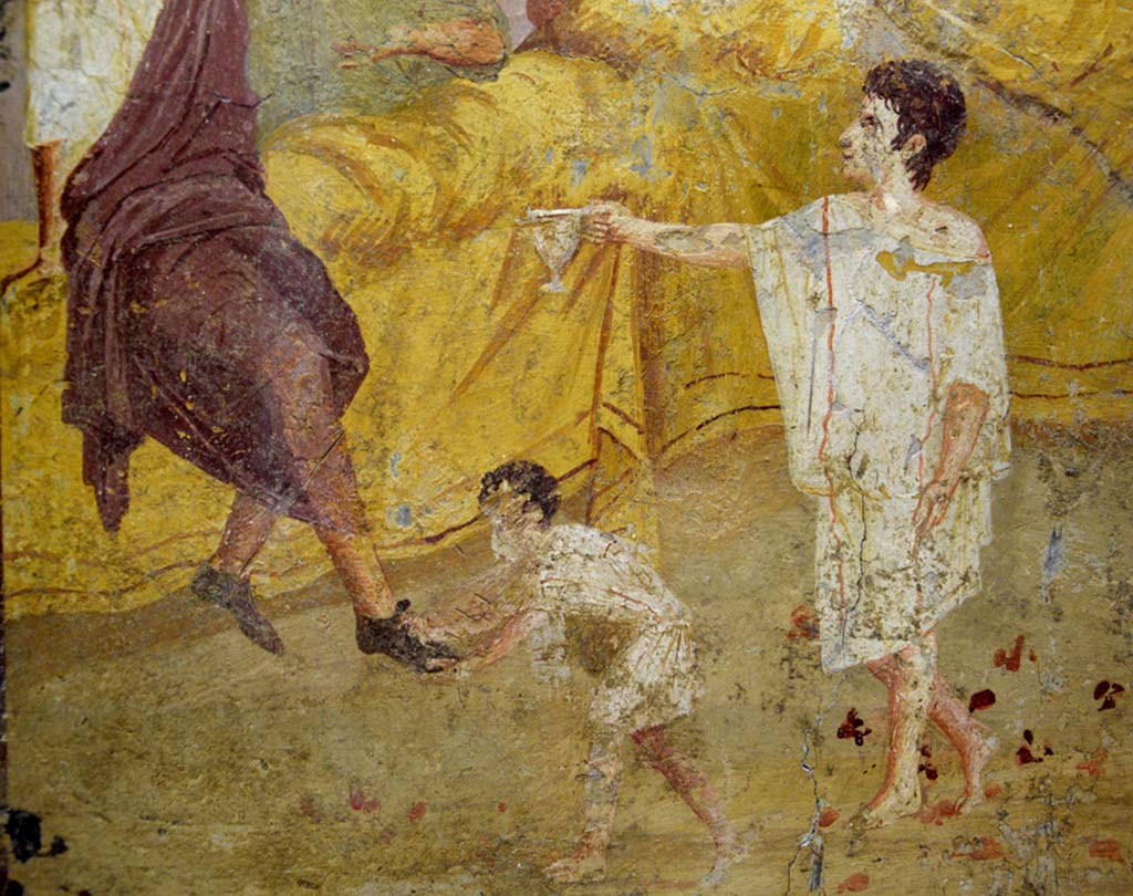 V.2.4 Pompeii. June 2017.
Room 15, detail from painting of banqueting scene from east wall of triclinium. Photo courtesy of Johannes Eber.