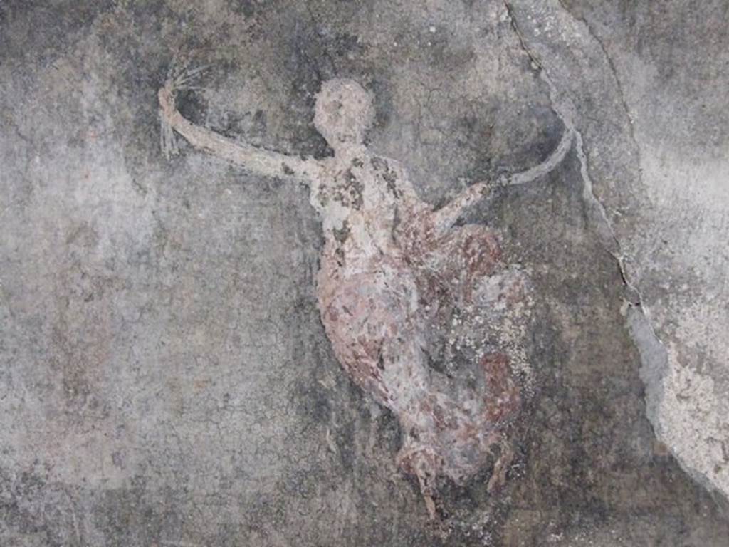 V.2.4 Pompeii. South wall of room 15, triclinium. Floating female figure with sickle in one hand and a sheaf in the other.