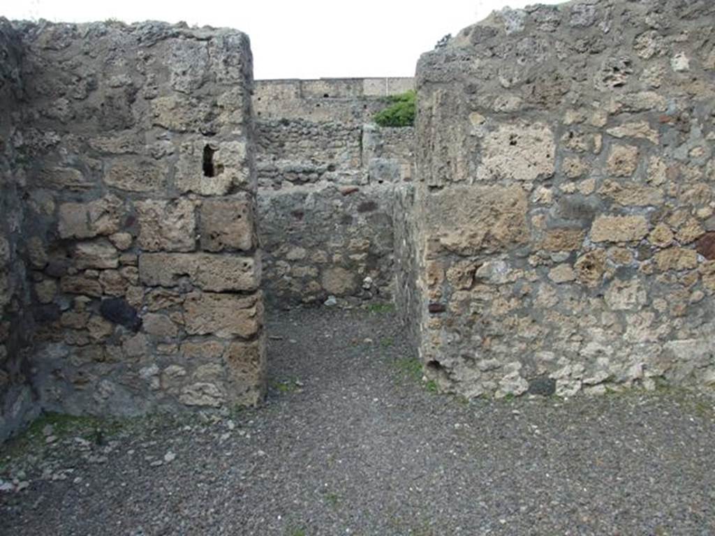 V.2.6 Pompeii. March 2009. North wall of shop, and doorway to rear room.