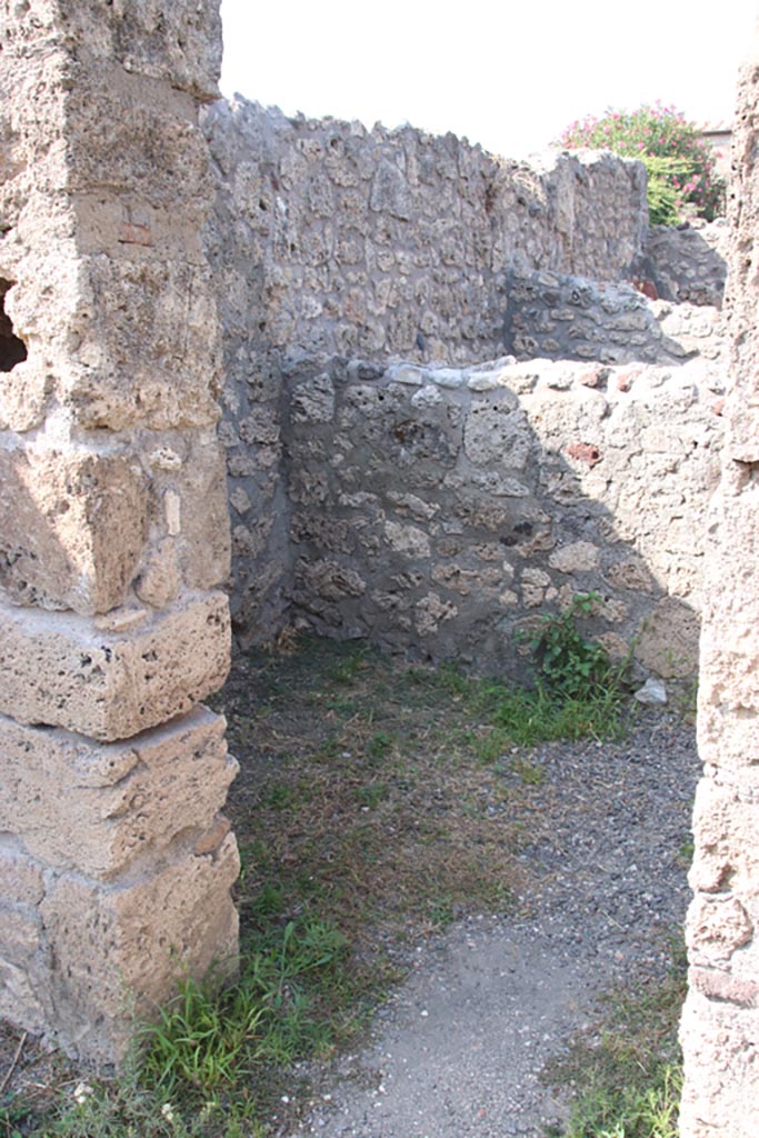 V.2.6 Pompeii. October 2023.
Doorway in north wall of shop-room, into rear room. Photo courtesy of Klaus Heese.