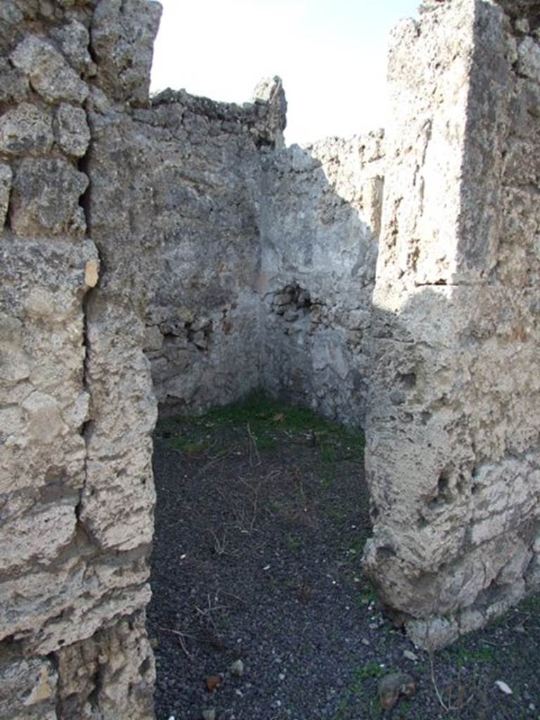 V.2.7 Pompeii. December 2007.
Doorway to room 4, according to Mau “painted in the last style on a white background”.