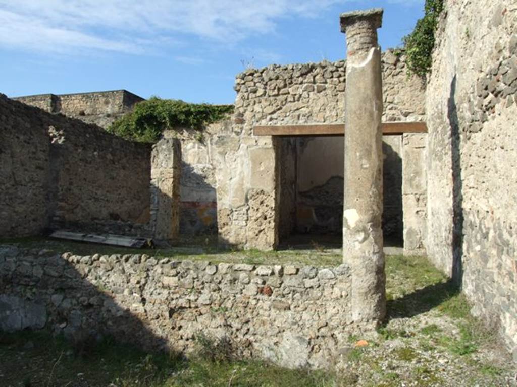 V.2.10 Pompeii. December 2007. Looking north in peristyle towards two doorways under the north portico.
Doorway to room 11 on right, and room 12 on left.
According to Mau –
“The First style decoration was conserved in both rooms 11 and 12. The simplicity of this decoration – yellow zoccolo, red frieze, then white stucco – in the two most spacious rooms of the house, triclinia without doubt, demonstrated that it was inhabited at that time by people of modest means”.
See Mau in BdI, 1894, p.43.