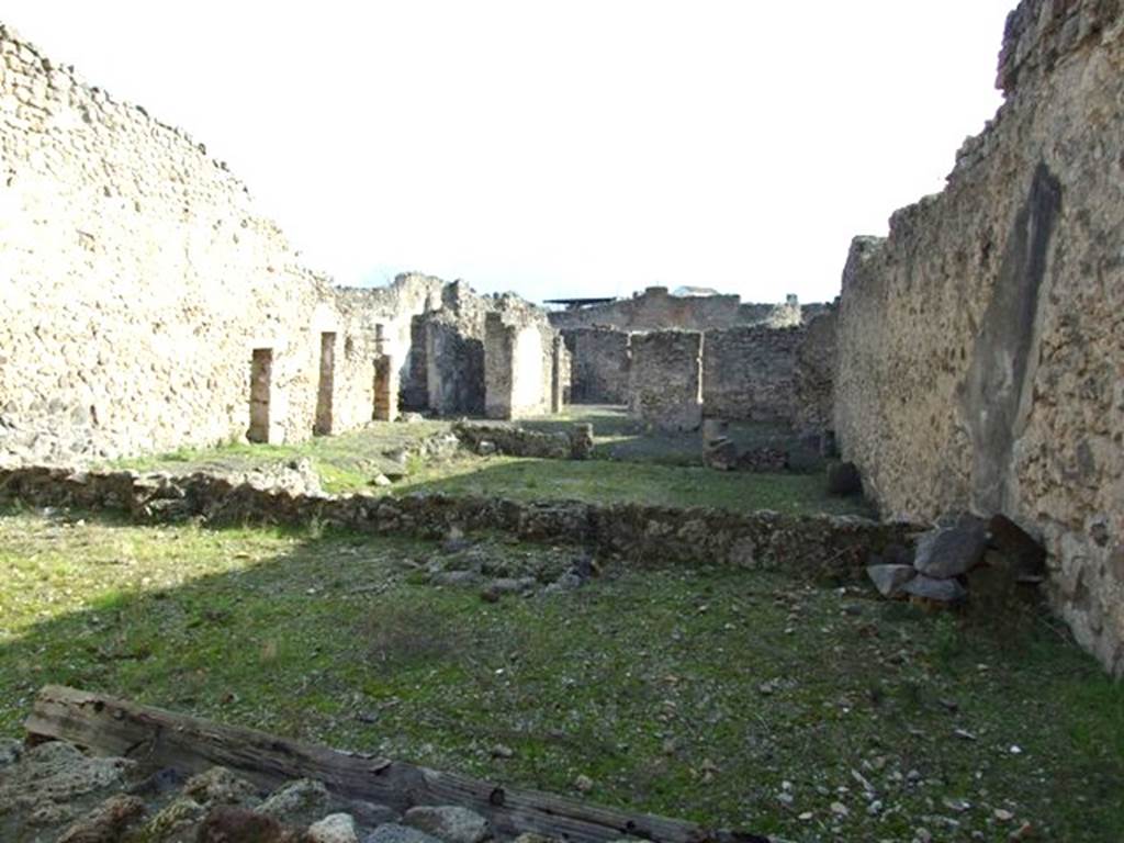 V.2.10 Domus of Paccia. Looking south from room 12 across peristyle to front of house.