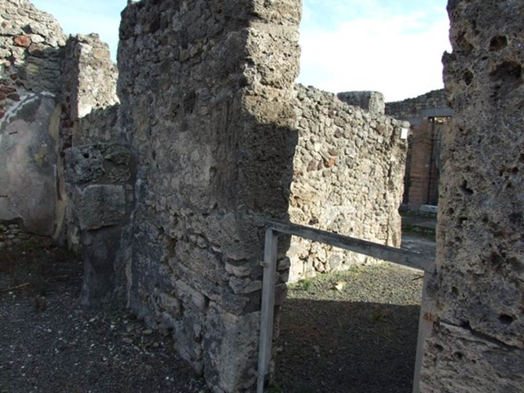 V.2.10 Pompeii. December 2007. South-east corner of atrium showing part of south wall of room 6 and looking into V.2.11.