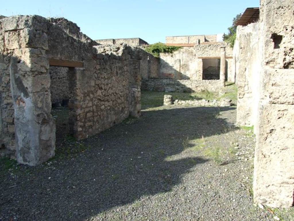 V.2.10 Pompeii. December 2007. Room 3, tablinum with doorway to room 7 on left. Looking north from atrium.