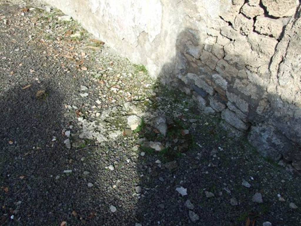 V.2.15 Pompeii. December 2007. Remains of base of staircase against east wall.