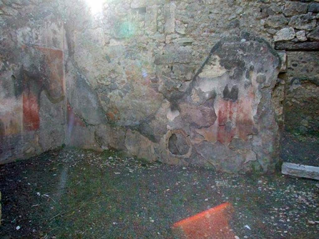V.2.15 Pompeii. December 2007. Room 4, west wall.
According to NdS, this room had a window overlooking the peristyle in its north wall.
The walls were decorated with panels of red and yellow. Its dado imitated coloured marble.
For the description of the paintings and graffiti found in this room, see Notizie degli Scavi di Antichità, 1891, p. 271.