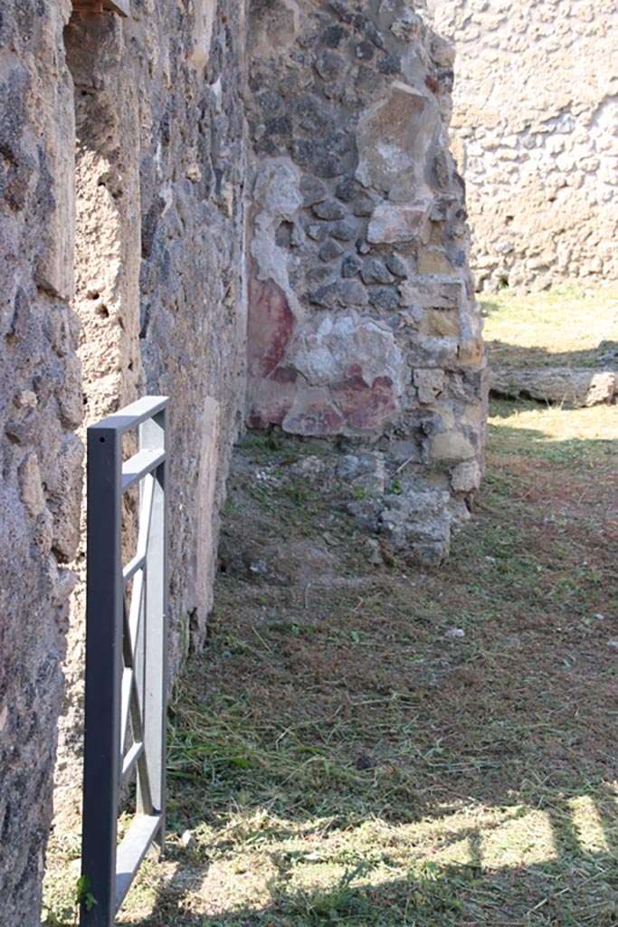 V.2.19 Pompeii. October 2022.
Looking north along site of stairs along west wall, with doorway to V.2.17, on left.
Photo courtesy of Klaus Heese.