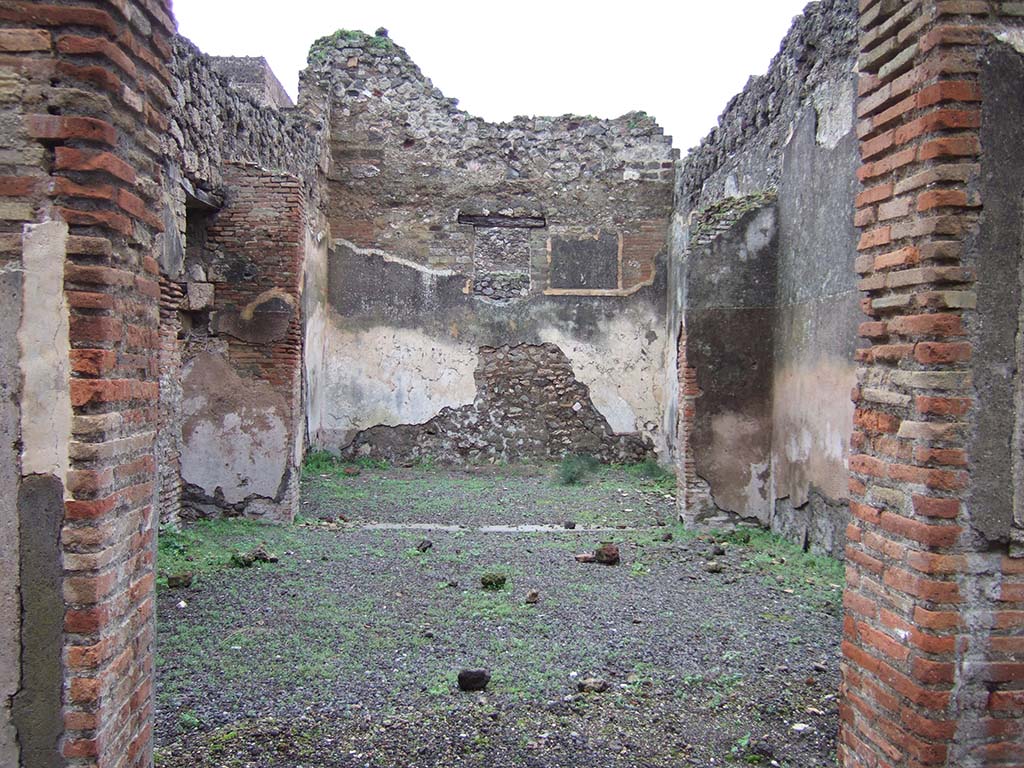 V.2.e Pompeii. December 2005. Looking east across atrium, towards the triclinium with a window overlooking the garden of V.2.g.
According to NdS, the atrium was found with no flooring and with rustic walls except for a high dado of brick plaster (mattone pesto).
The triclinium was situated opposite the entrance on the east side of the atrium.
Its decorated walls were divided into panels with cupids and flying deer.
See Notizie degli Scavi di Antichità, 1896, (p.433)
See Mau in Bullettino dell’Instituto di Corrispondenza Archeologica (DAIR), VIII, 1893, (p.4-7)