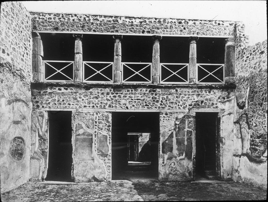 V.2.h Pompeii. Looking across atrium towards south wall, and upper floor with columns. 
Photo by permission of the Institute of Archaeology, University of Oxford. File name instarchbx202im 003. Source ID. 44511.
See original on Oxford HEIR database
