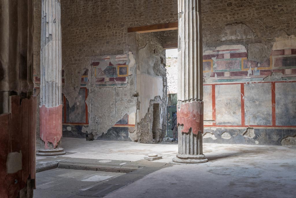 V.2.i Pompeii. March 2023.
Room 1, looking north-west across atrium towards entrance corridor and small doorway to room 2. Photo courtesy of Johannes Eber.
