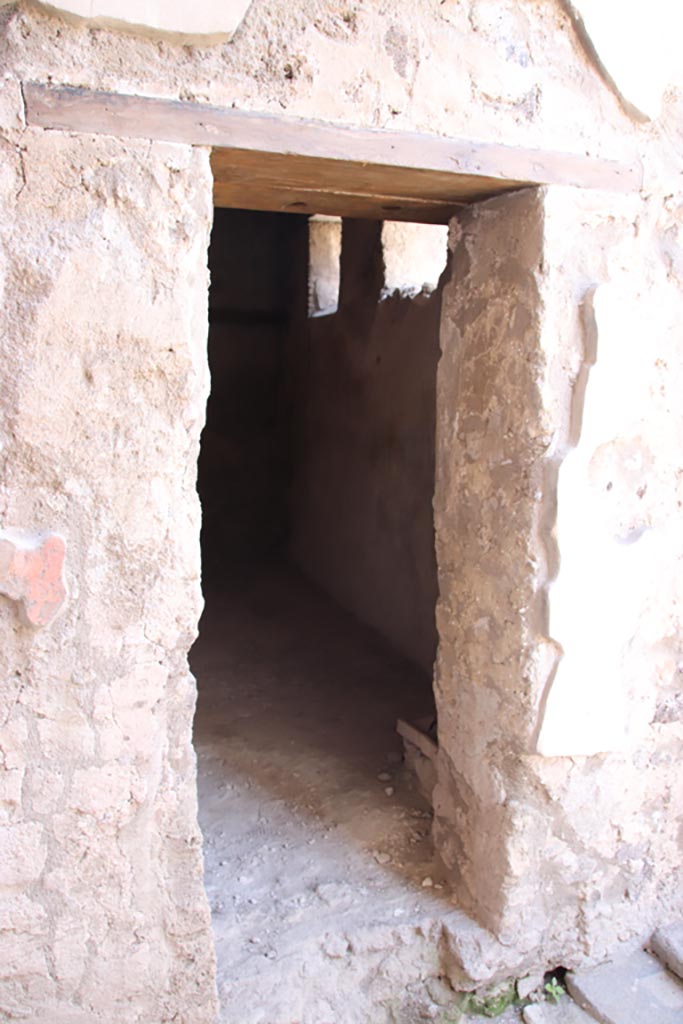 V.2.i Pompeii. October 2023.
Room 2, doorway on west side of entrance corridor/fauces. Photo courtesy of Klaus Heese.