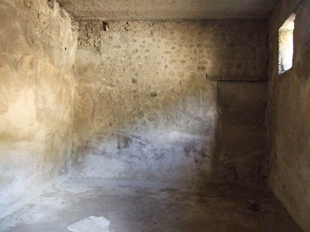 V.2.i Pompeii. March 2009. Room 2, West wall, with blocked doorway through to house at V.2.h