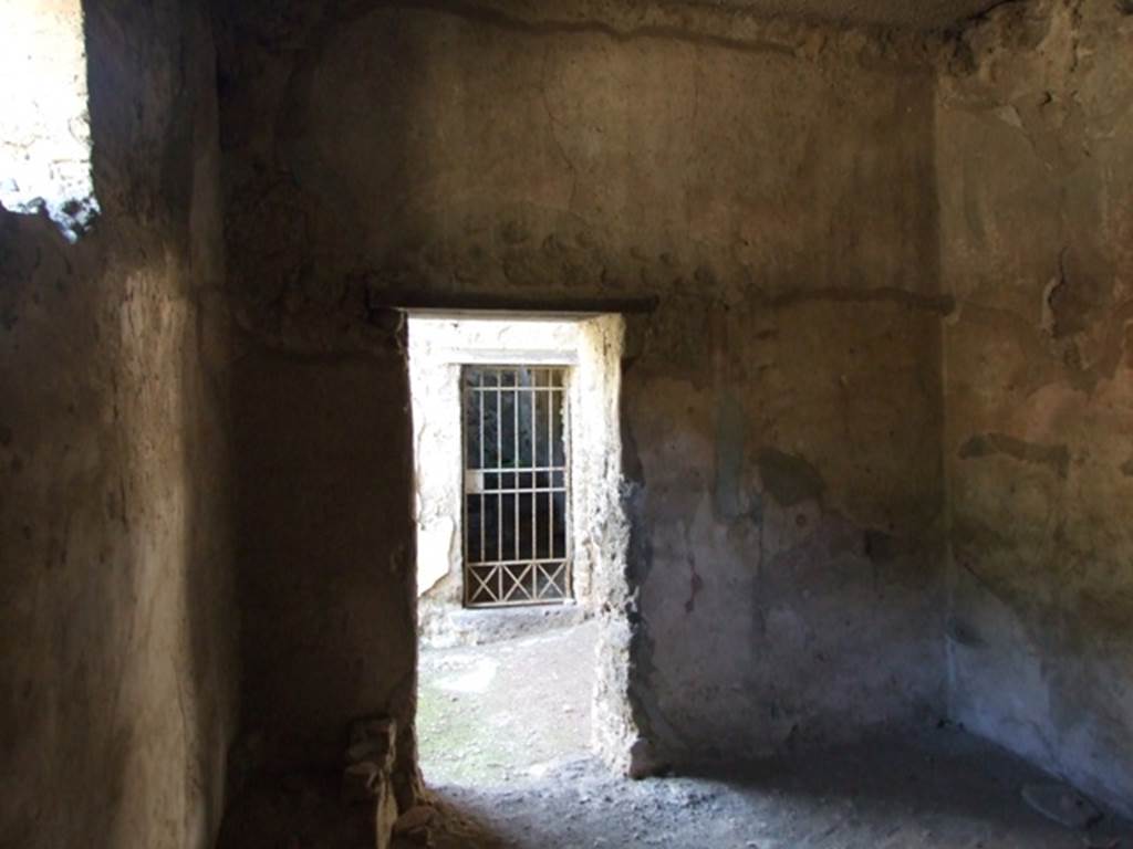 V.2.i Pompeii. March 2009. Room 2, East wall, with doorway to entrance corridor, and Room 3a directly opposite.