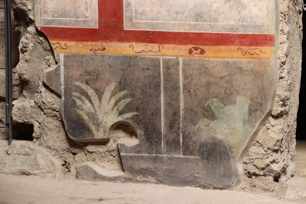 V.2.i Pompeii. October 2023. Room 1, lower east wall, zoccolo on north side of doorway to room 4, on right. Photo courtesy of Klaus Heese.