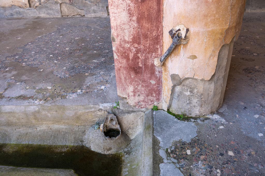 V.2.i Pompeii. January 2024. Room 23, details of lead pipe work in north-west corner of peristyle. Photo courtesy of Johannes Eber.