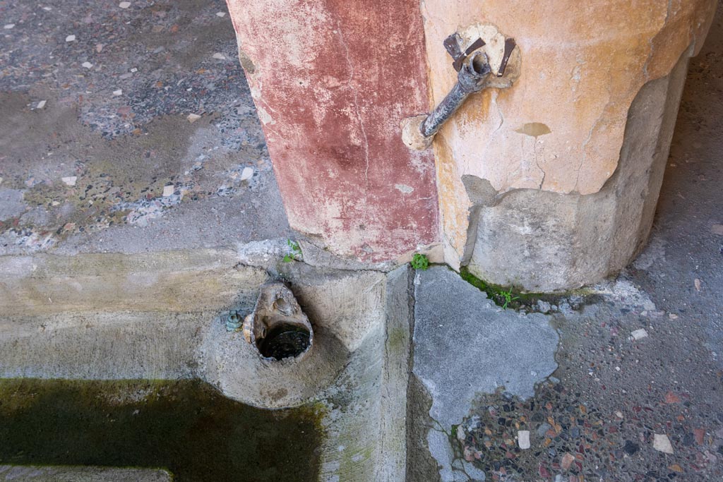 V.2.i Pompeii. January 2024. Room 23, looking west to remains of pipes in north-west corner of peristyle. Photo courtesy of Johannes Eber.