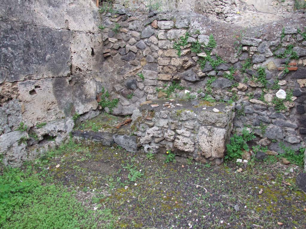 V.3.3 Pompeii. May 2010. Base of steps to upper floor in north-west corner of shop.