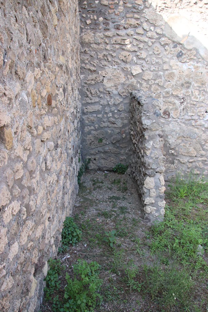 V.3.3 Pompeii. October 2023.
Looking north in latrine in north-west corner of rear room. Photo courtesy of Klaus Heese.