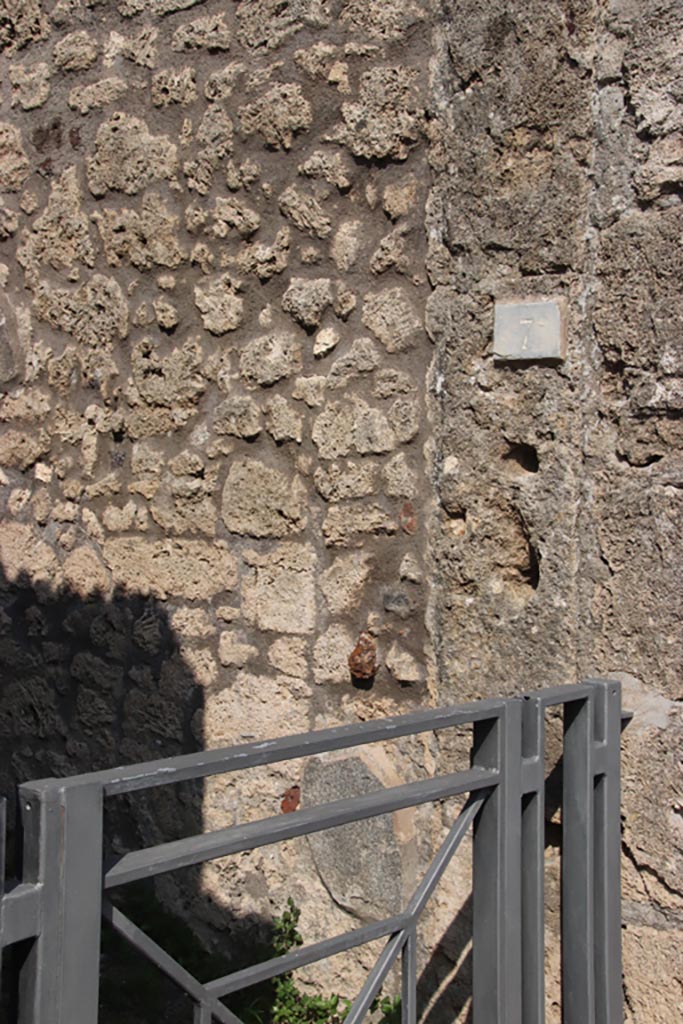 V.3.7 Pompeii. October 2023.
Looking east to entrance doorway on Via di Nola. Photo courtesy of Klaus Heese.