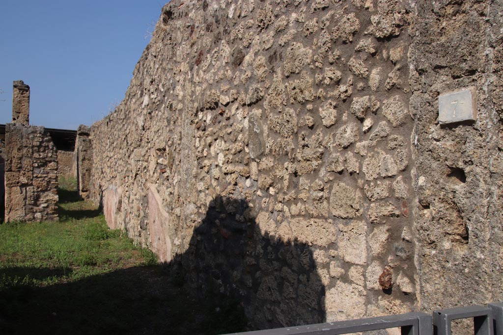 V.3.7 Pompeii. October 2023.
Looking north from entrance doorway along east wall of vestibule, atrium and corridor. Photo courtesy of Klaus Heese.