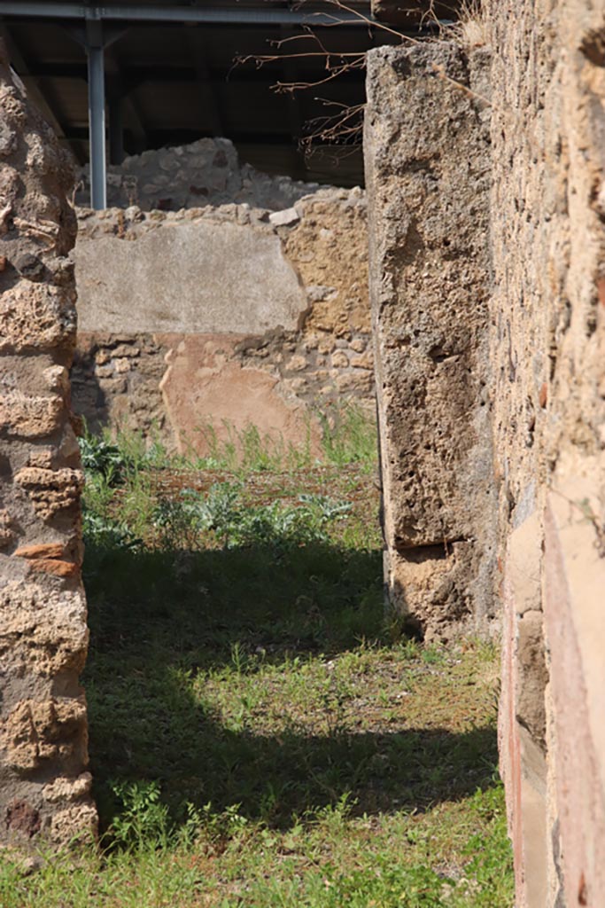 V.3.7 Pompeii. October 2023.
Looking north along corridor to garden area. Photo courtesy of Klaus Heese.