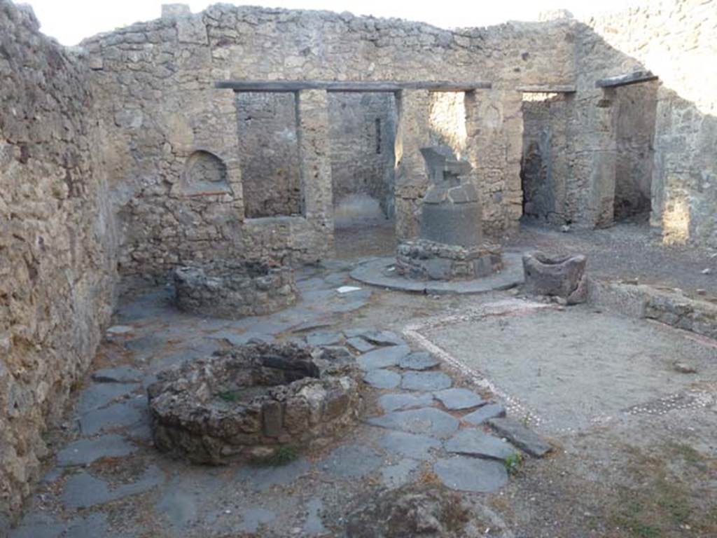 V.3.8 Pompeii. June 2012. Looking north across west side of bakery atrium. Photo courtesy of Michael Binns.