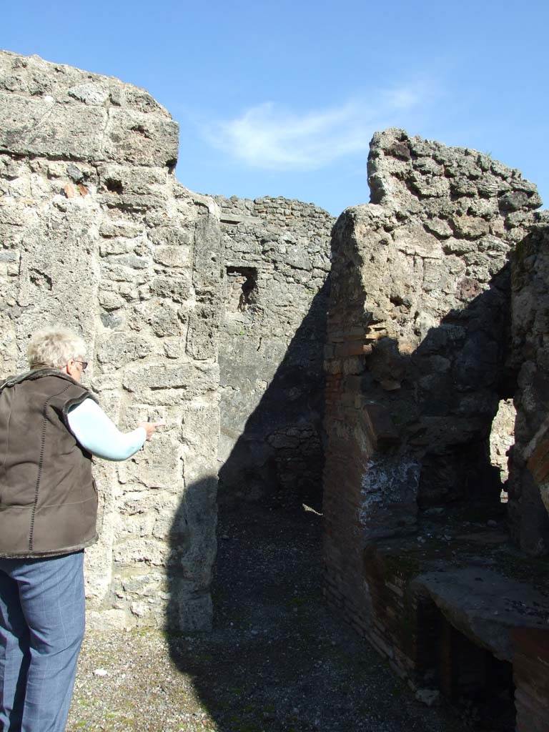 V.3.8 Pompeii. March 2009. Entrance door to small room on east side of oven.