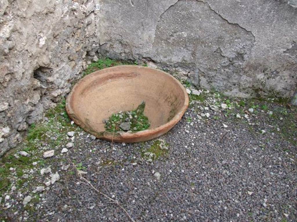 V.3.8 Pompeii. December 2007. Small room on east side of oven. Terracotta bowl in north east corner.